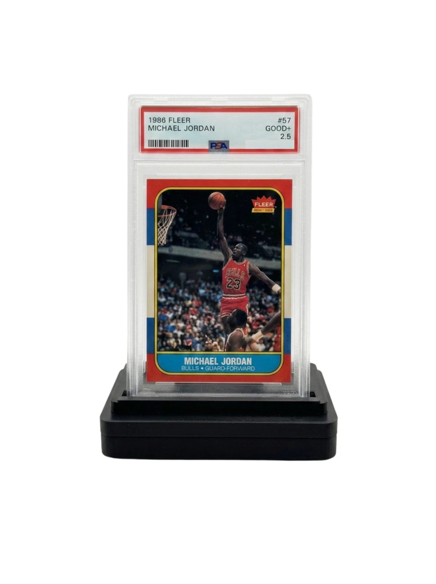 GO-001 holding a PSA-graded 1986 Fleer Michael Jordan slab
